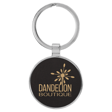Load image into Gallery viewer, Black/Gold 1 1/2" Laserable Leatherette/Metal Round Keychain
