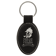 Load image into Gallery viewer, Black/Silver 3" x 1 3/4" Laserable Leatherette Oval Keychain
