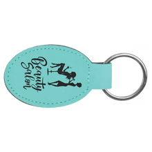 Load image into Gallery viewer, Teal 3" x 1 3/4" Laserable Leatherette Oval Keychain
